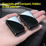 Mini diecast metal model cars, two small rectangular cars with black and white body