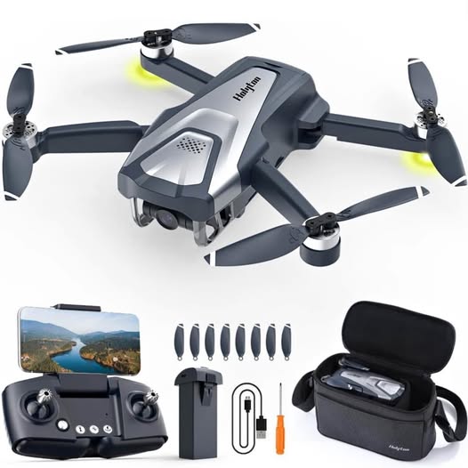 Drone with camera and controller, plus spare propellers and carrying case