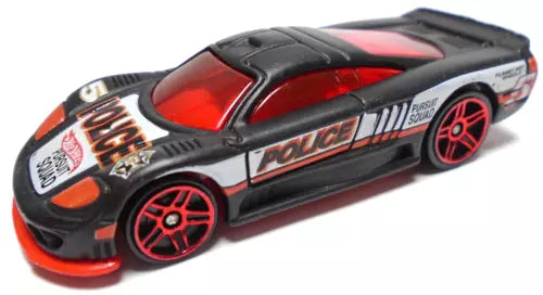 Black and red police graphics die-cast toy car with red wheels, front three-quarter view