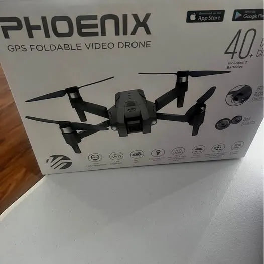 Foldable GPS video drone box with central drone and four propellers