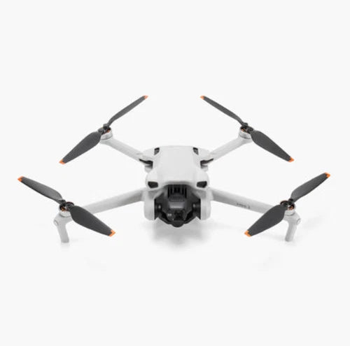 Foldable quadcopter drone with four propellers and front camera module
