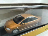 MINICHAMPS diecast Opel Astra coupe model car in metallic gold with black roof