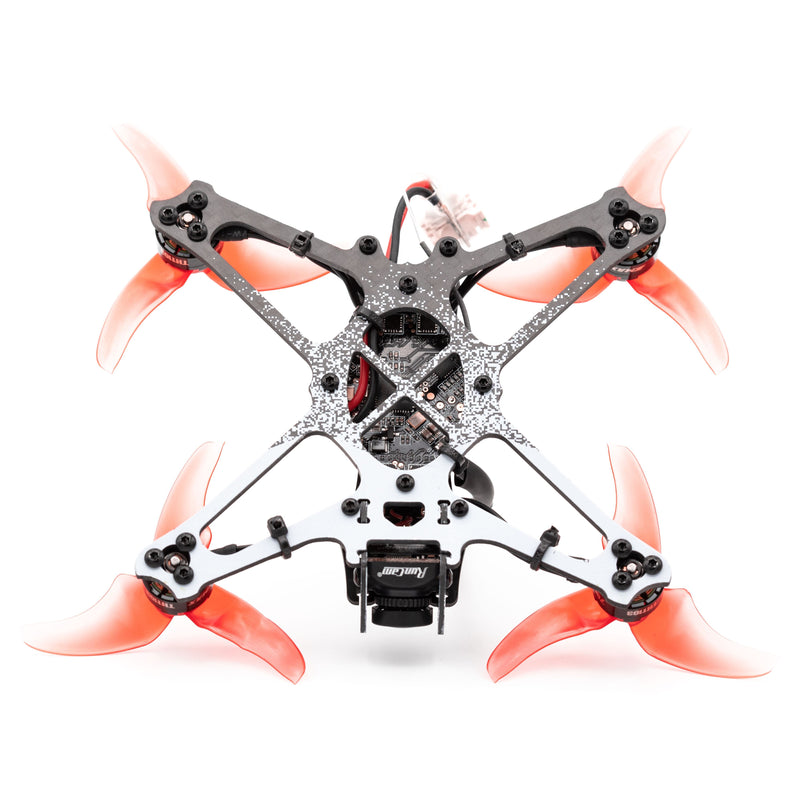 FPV quadcopter drone with gray frame, orange propellers, and front camera module