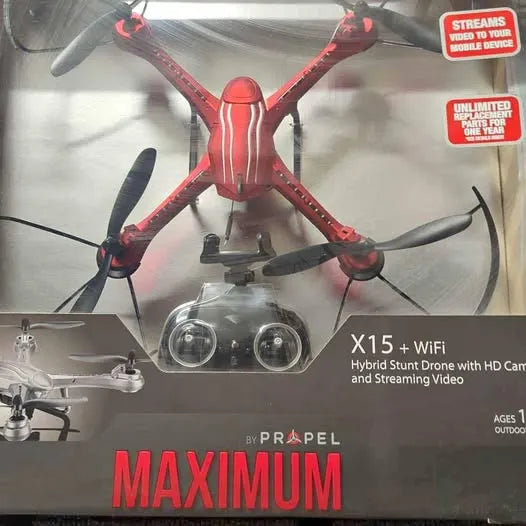 Red and black quadcopter drone with propellers, boxed for sale