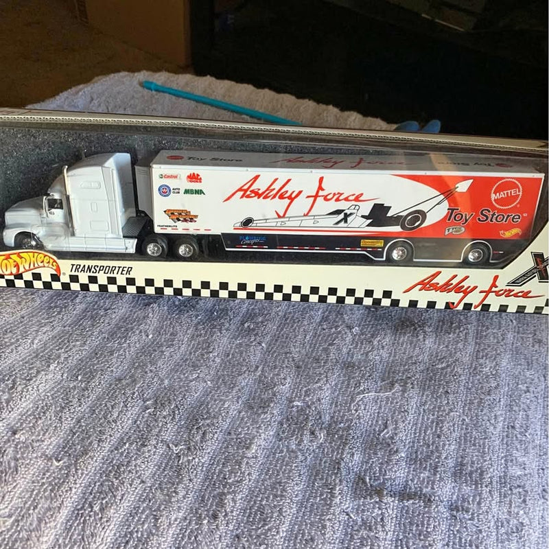 Ashley Force diecast transporter toy truck with white cab and black trailer