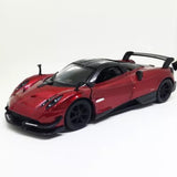 Red diecast sports car model toy with black wheels and aerodynamic front