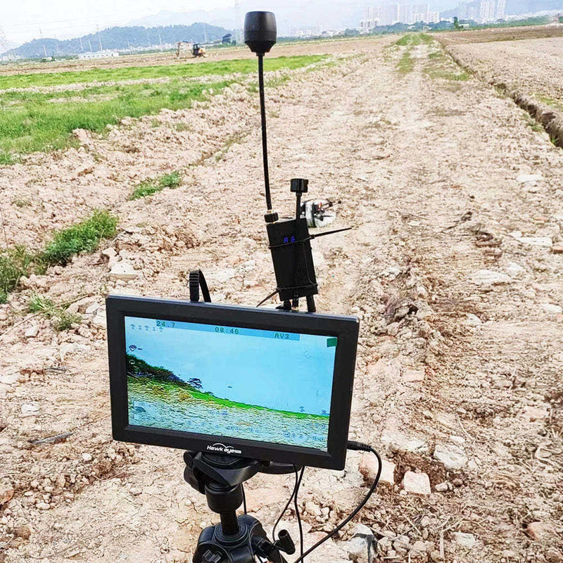 FPV RC drone with tall antenna and monitor screen on stand