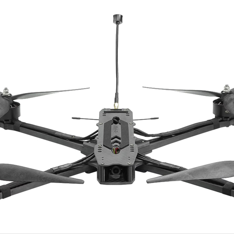 Black quadcopter FPV racing drone with camera and central control module, four propellers