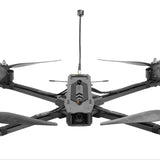 Black quadcopter FPV racing drone with camera and central control module, four propellers