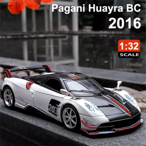 1:32 scale sports car model diecast with silver body, black stripes, red trim