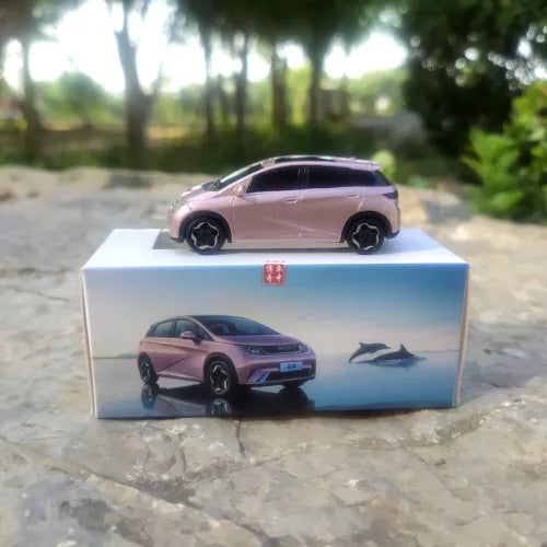 Light purple BYD Dolphin diecast model car on display box with black wheels