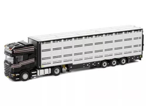 Diecast livestock transport truck model with white cargo box and black cab, 3-axle trailer
