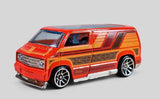 Orange 1977 custom van die-cast model, front three-quarter view, 1:64 scale