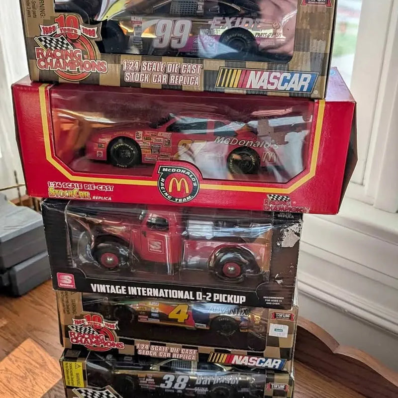 Boxed 1:24 scale die-cast NASCAR cars set, vintage international pickup and race car