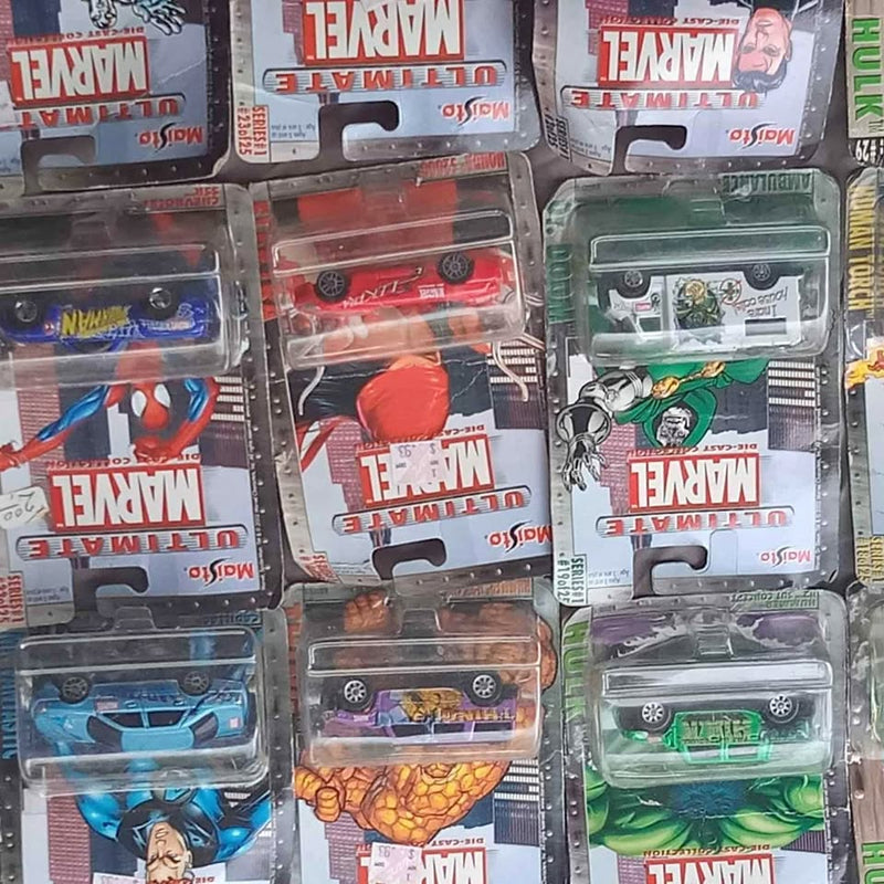 Assorted diecast toy cars in blister packaging, multiple colors and vehicle designs