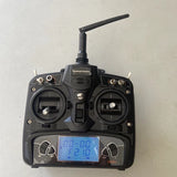 Swagtron drone remote control with screen, two thumb sticks, side dials, and antenna