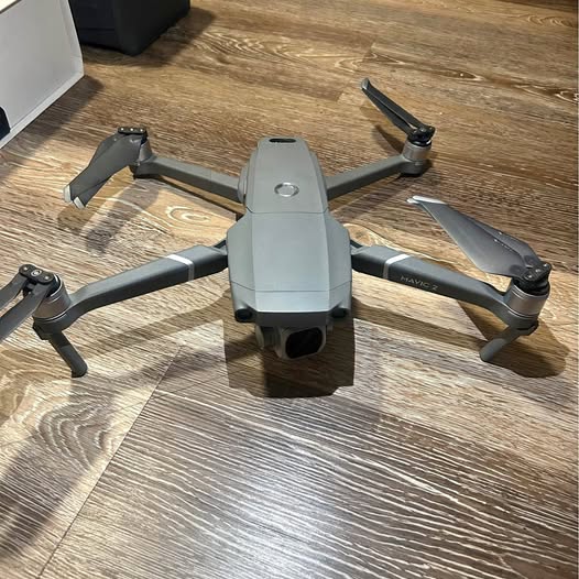 DJI Maverick 2 Pro drone with four propellers, gray body and front camera pod