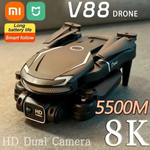 Gray and black quadcopter drone with dual camera, front view.