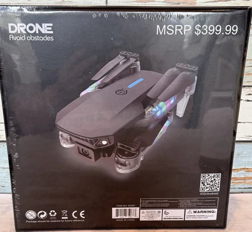 Retail drone product box with image of grey quadcopter and camera icon