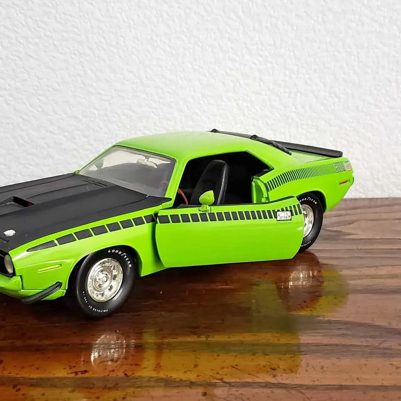Lime green diecast Cuda Wilton ND muscle car with black hood and whitewall tires