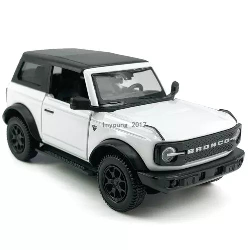White diecast Ford Bronco model SUV toy car with black wheels, front 3/4 view