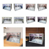 Transparent display case for diecast model cars, clear glass panels and black base, with light