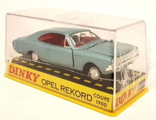 Light green diecast model car with red interior in clear display box, DINKY OPEL REKORD