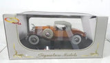 Diecast model car in display box, brown and gray classic racing style