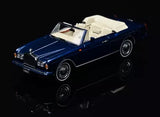 Blue diecast convertible model car toy with beige soft top, 1:64 scale