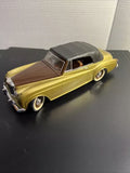 Solido Gold 1961 Bentley diecast car, 1:20 scale, yellow with brown top, front 3/4 view