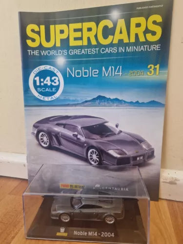 1:43 scale diecast car model of 2004 Noble M14 in retail box