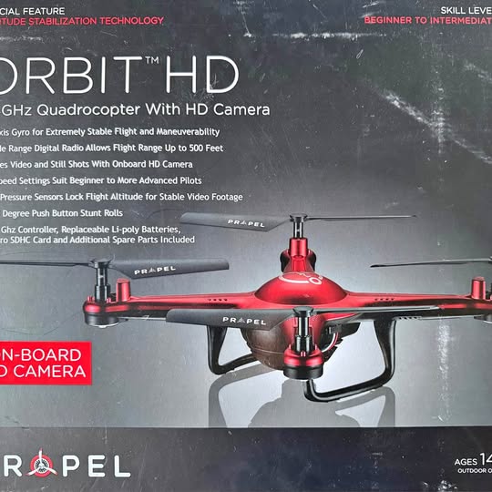 Propel Orbit HD quadcopter drone, red body with front HD camera