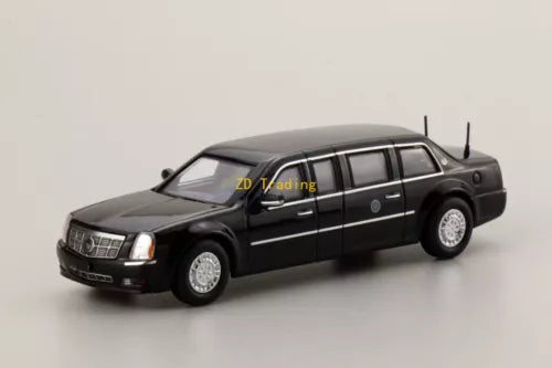 Black luxury limo diecast metal car model, side view with chrome grille and wheels