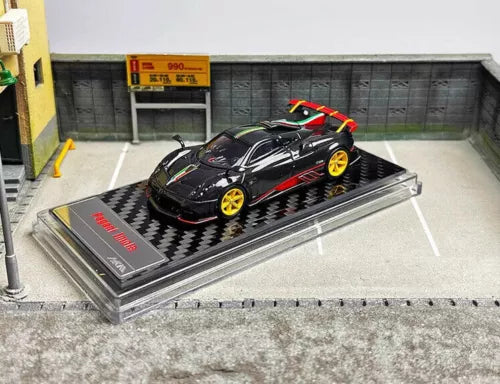 Pagani Imola 827HP V12 diecast sports car, black with red accents and yellow rims