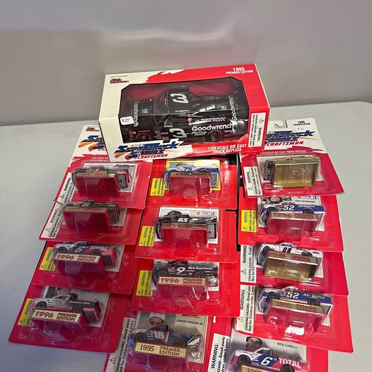 Diecast racing car set in red blister packaging with multiple toy vehicles