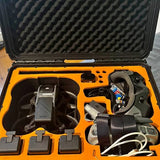 DJI Avata drone accessories in hard case, with controller and cables