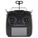 Drone remote controller with dual thumbsticks, LCD screen, buttons, and top handle