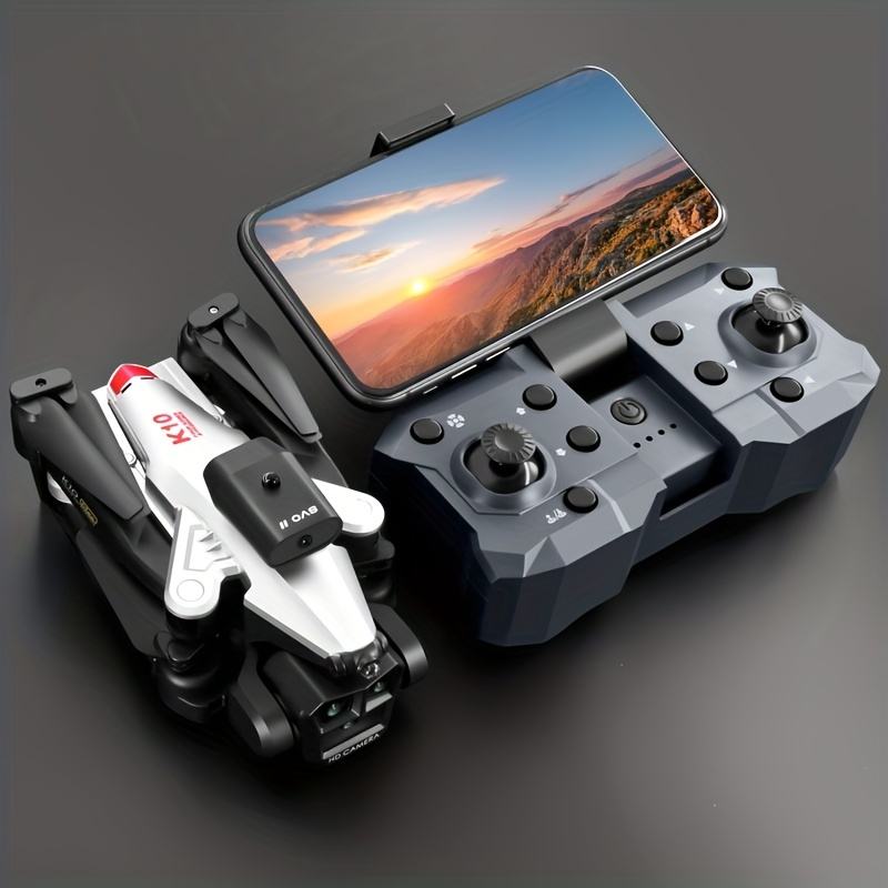 Foldable mini drone with remote controller, dark gray and white, dual-joystick design
