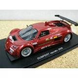Red die-cast Gumpert Apollo 2005 racing car model on black display base, detailed decals