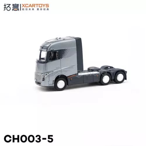 Grey 1/64 diecast truck tractor with black wheels and front cab detail