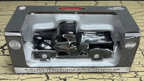 Diecast 1941 Plymouth pickup model in box, black and chrome front grille details