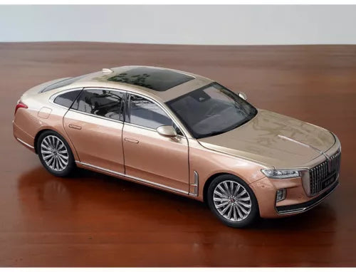 Gold diecast sedan model car with black roof, 1/18 scale