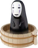 Metal diecast car with dark No Face mask on tan round base
