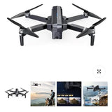 Quadcopter drone with four propellers and a central camera housing