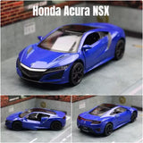 Blue metal diecast sports car model with black wheels and detailed bodywork