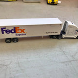 Diecast FedEx Express tractor trailer truck, white cargo box with gray cab
