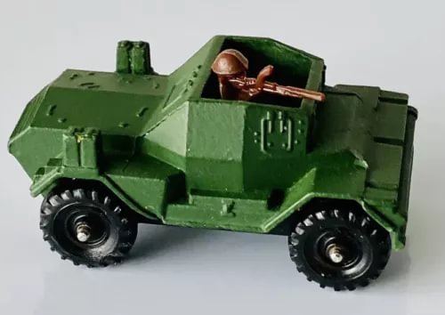 Green diecast army scout car with rugged tires and open turret