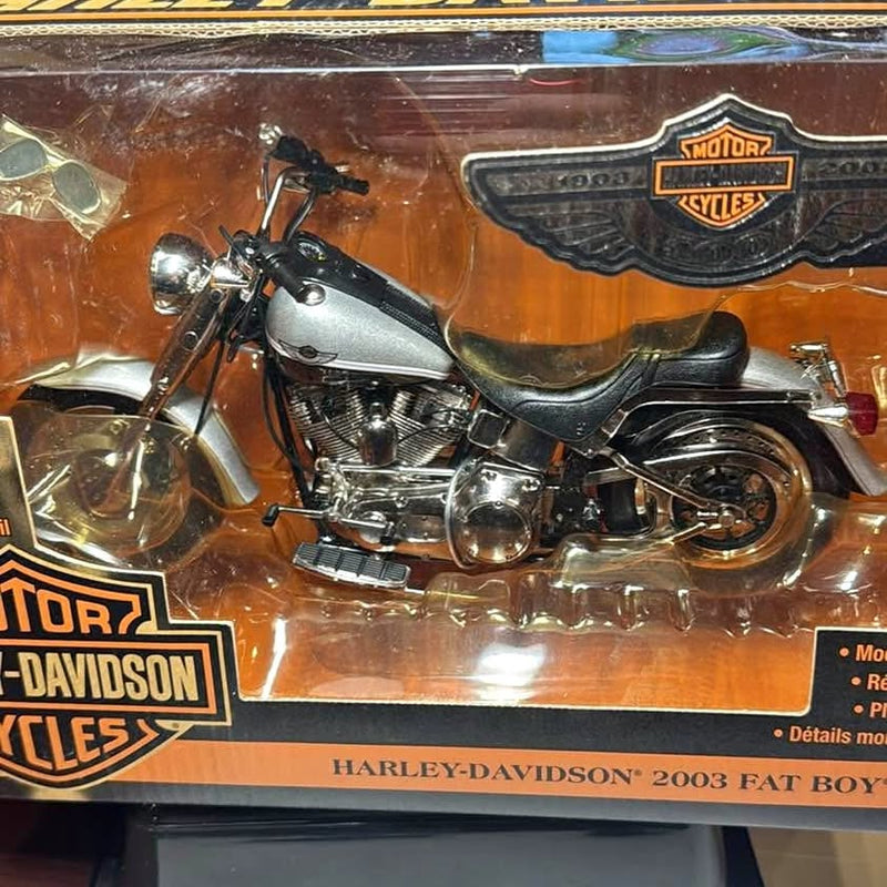 Harley-Davidson Fat Boy diecast motorcycle, silver/black with chrome engine details