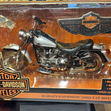 Harley-Davidson Fat Boy diecast motorcycle, silver/black with chrome engine details