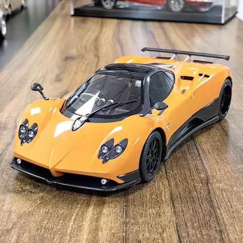Yellow Pagani Zonda F car diecast model with black wheels and front grille